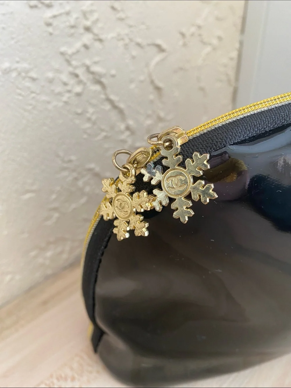 CHANEL Black Patent Cosmetic Pouch with Gold Zip Accents
